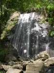 Yes you can climb the rocks to the base of the falls.JPG